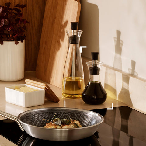 Eva Solo dressing shaker collection image shows versatile kitchen elegance.