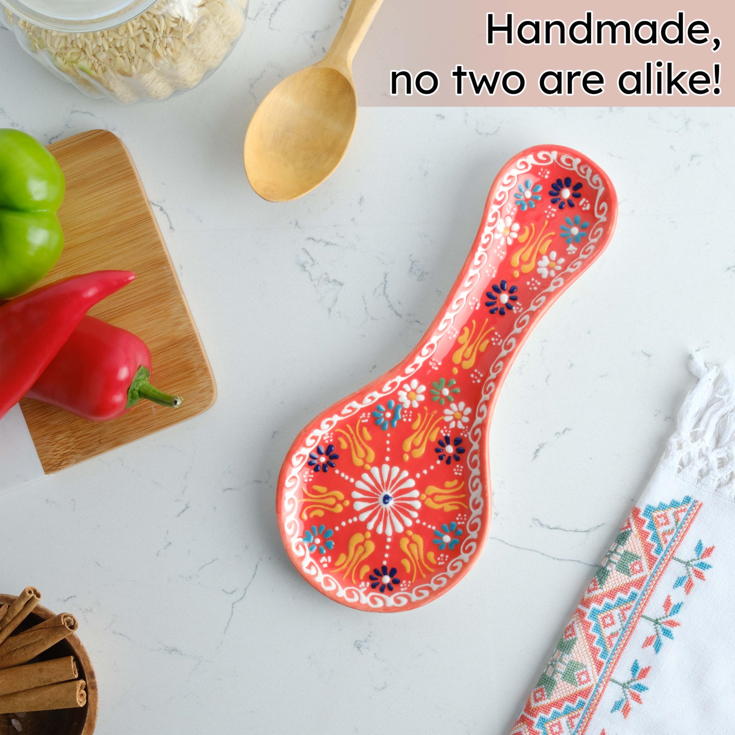 EVANILIFE orange spoon rest close-up, showing durable ceramic finish.