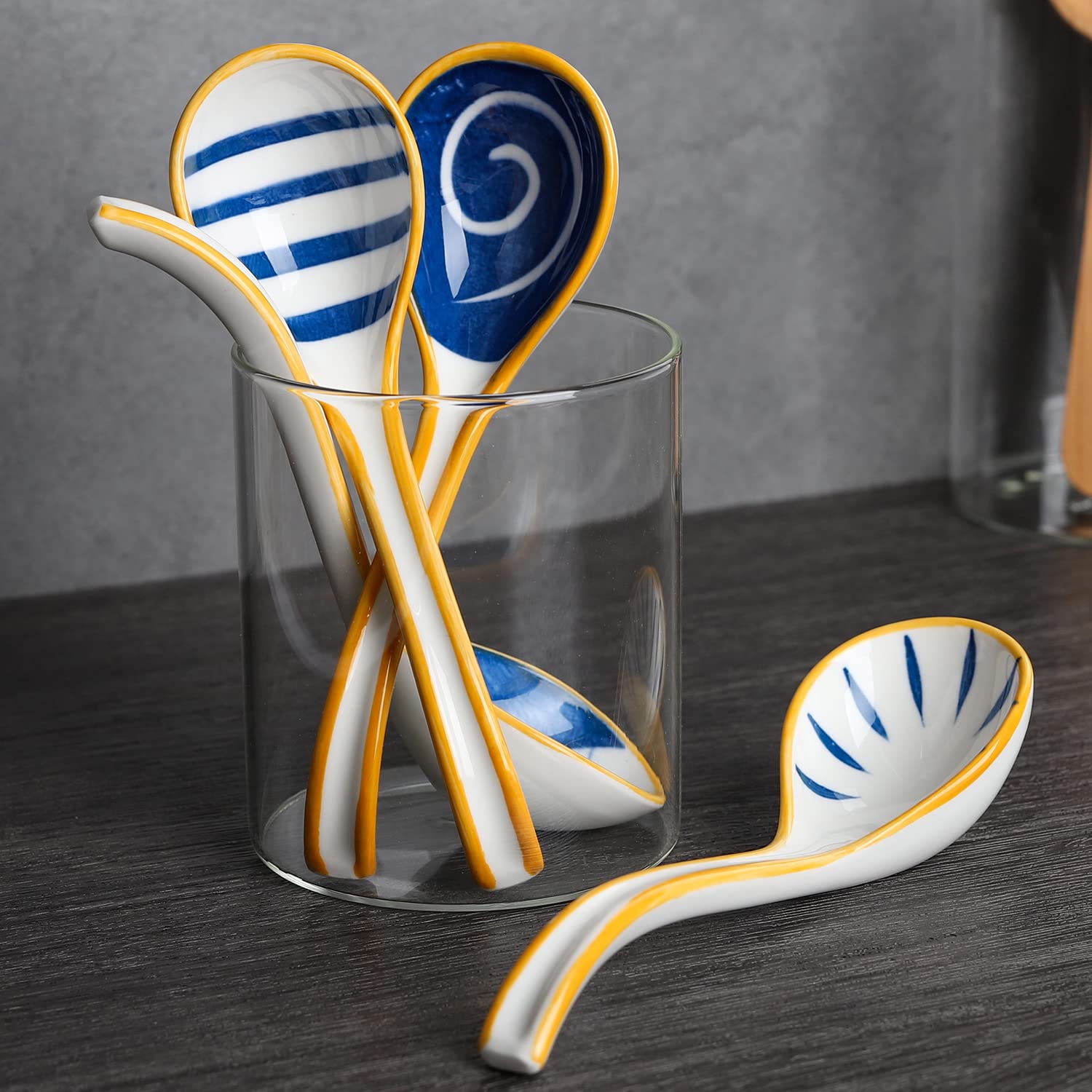 Evannt long-handle spoon showing underglaze patterns, great for dipping sauces