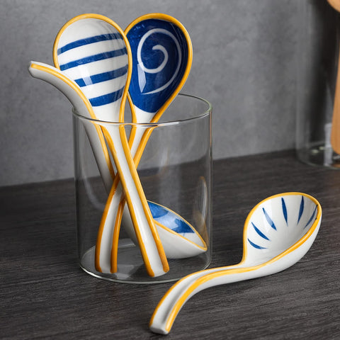 Evannt long-handle spoon showing underglaze patterns, great for dipping sauces