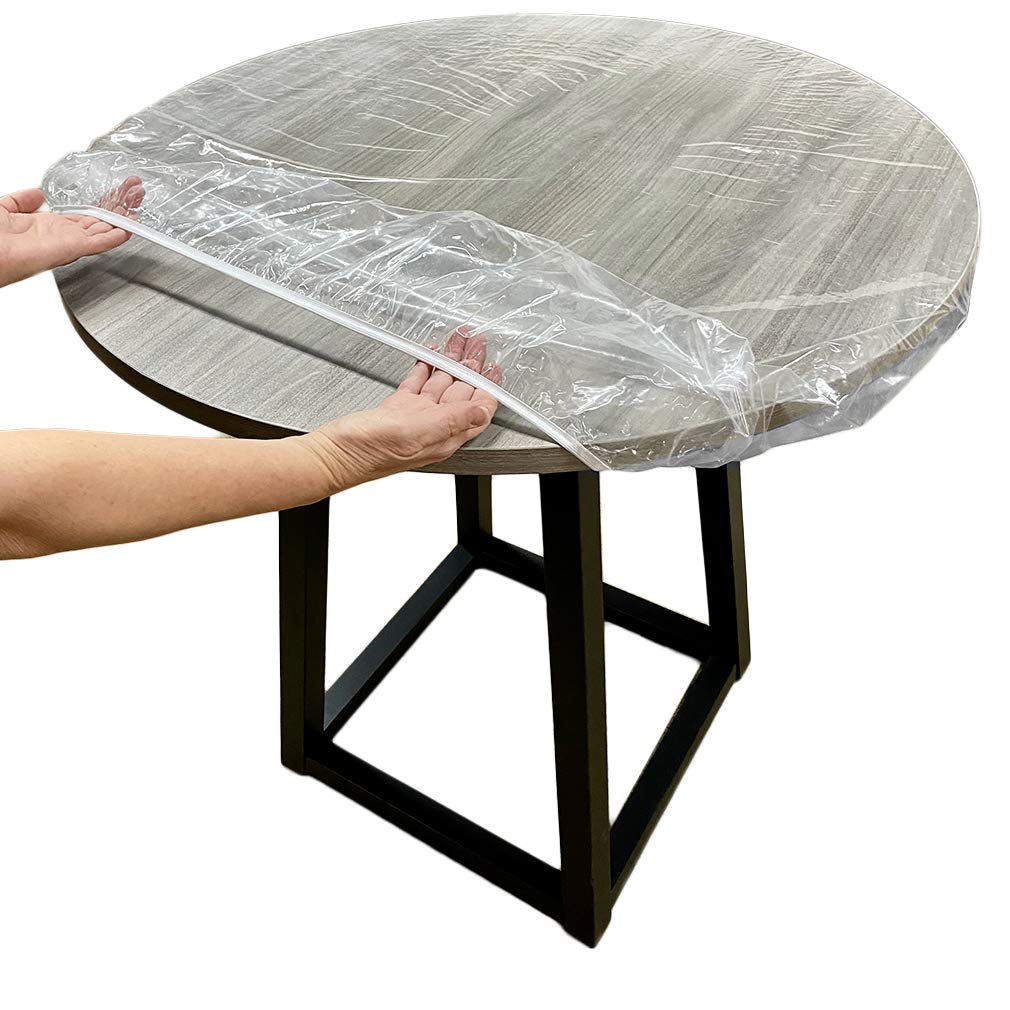 Evelots clear round table cover protecting a 36-42 inch table surface.