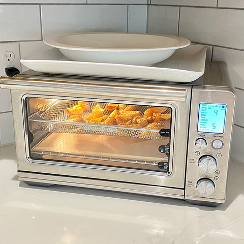 Evelots liner being trimmed to size demonstrates cut-to-fit capability.