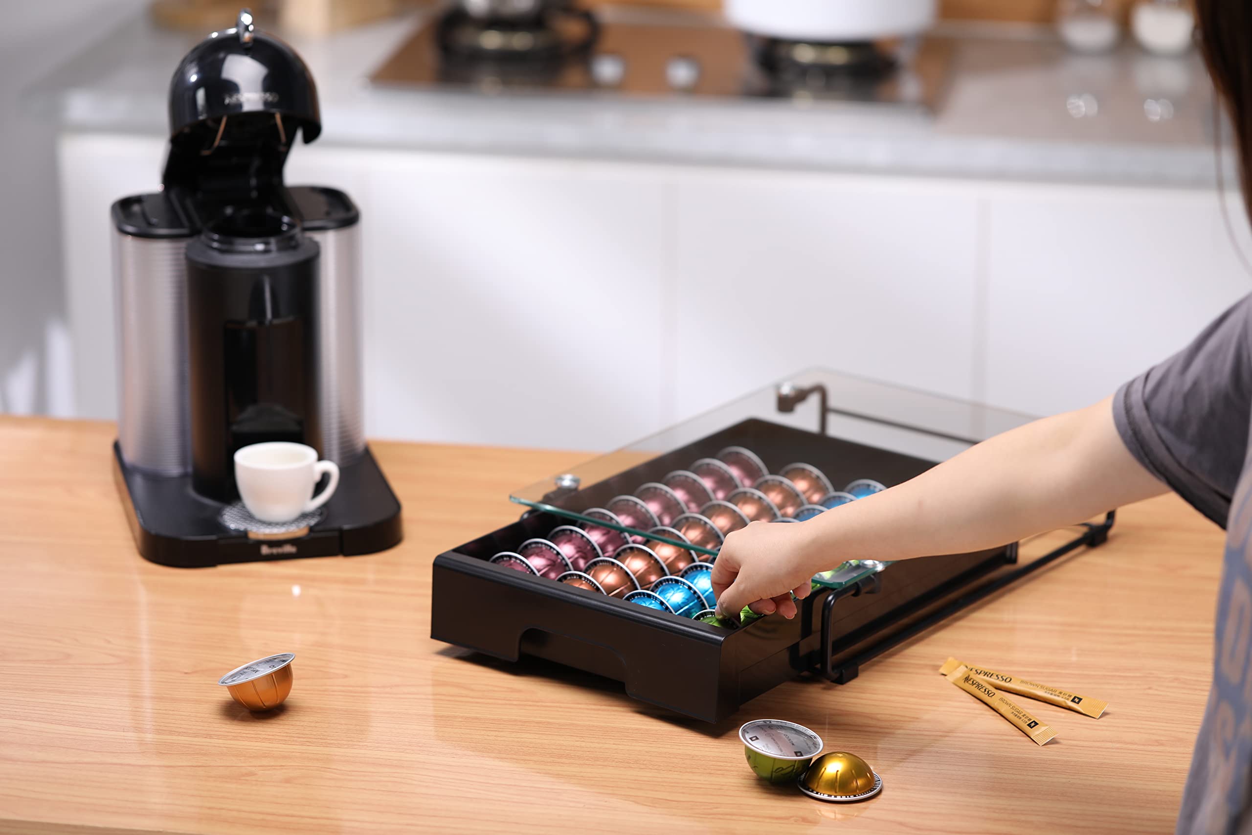 EVERIE crystal glass organizer with drawer open, showing capsule slots.