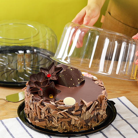 EWAFILU cake containers displayed on a counter for guests