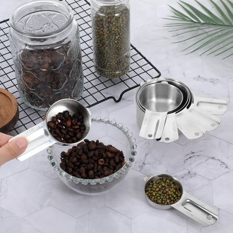 Exclaith measuring cups nest for space saving storage on kitchen shelves