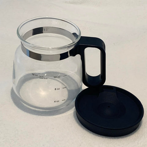 EXIGENT Coffee Pot travel lid keeps beverages secure during on-the-go breaks.