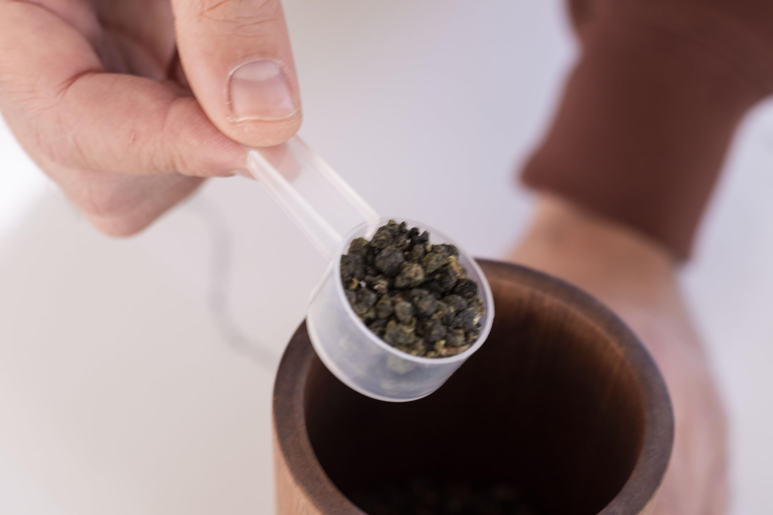 Existing Beauty 50-pack tablespoon spoons in use with coffee.
