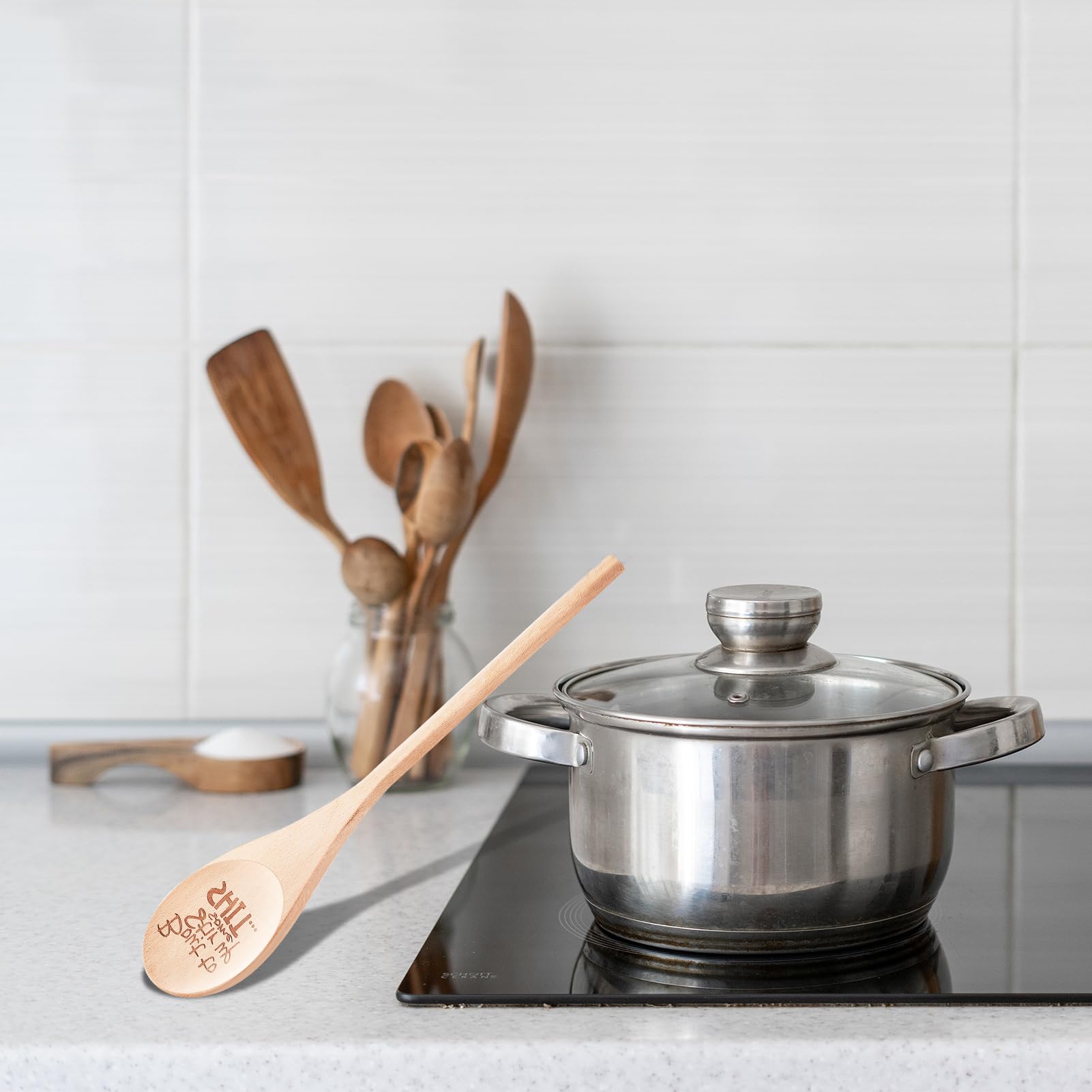 EYEOO long-handle spoon ideal for deep pot stirring and safe handling.