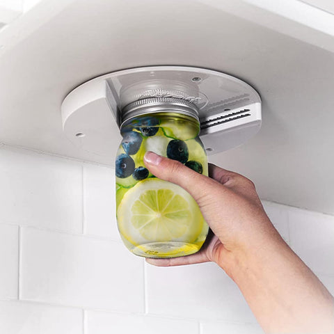 EZ Off jar opener under-cabinet mount demonstrates effortless one-handed use.