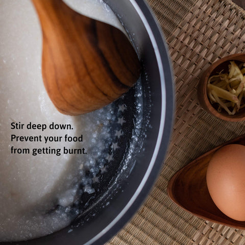 FAAY teak corner spoon wood grain adds natural warmth while cooking