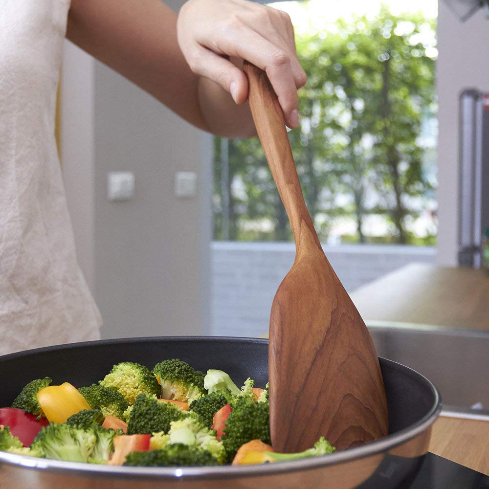FAAY teak wood spatula with coconut oil finish for nonstick pans.