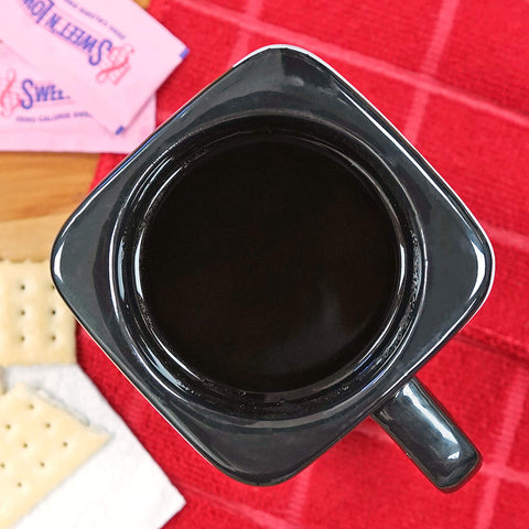 Fairly Odd Novelties Instant Camera Mug, microwave-safe for quick reheats.