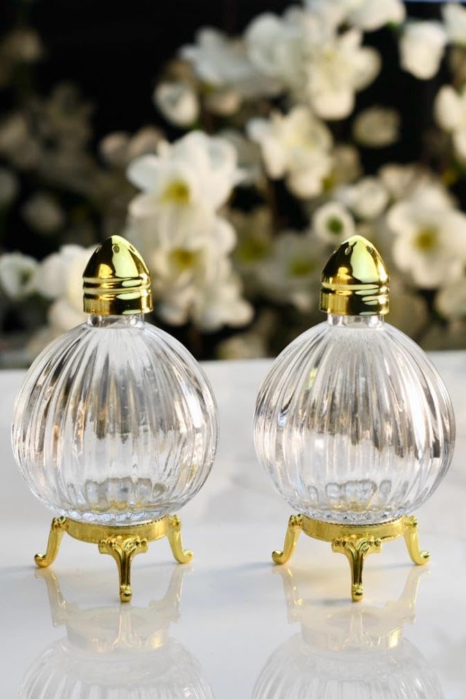 Fairturk globe salt shaker — clear glass body lets you monitor salt levels.