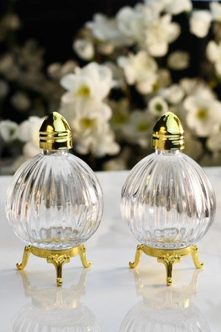 Fairturk globe salt shaker — clear glass body lets you monitor salt levels.