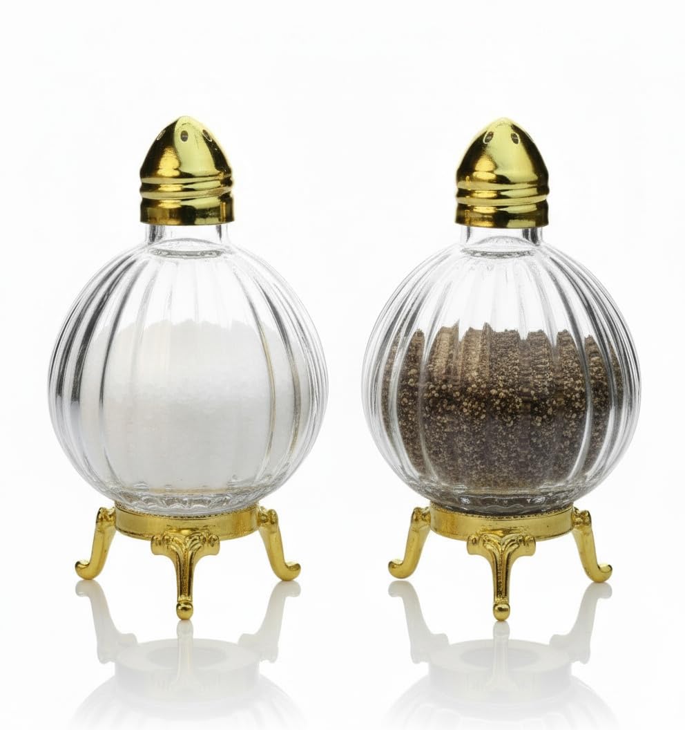 Fairturk globe salt shaker with gold stand — top view enhances formal table aesthetics.