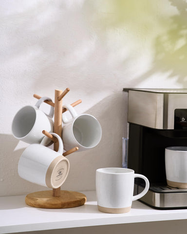 Gift-ready Famiware mug set beside a present for housewarmings.
