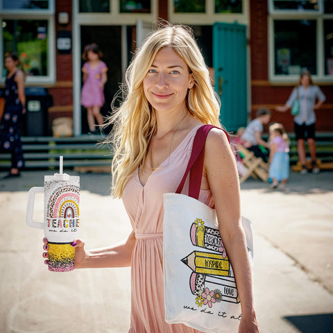 Fancyfams tumbler beside a canvas tote bag for back-to-school gifting.