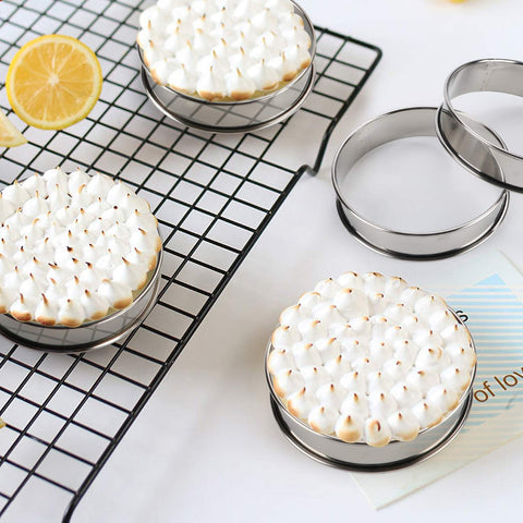 FANGSUN nonstick round cake ring keeps layers intact for clean cakes.