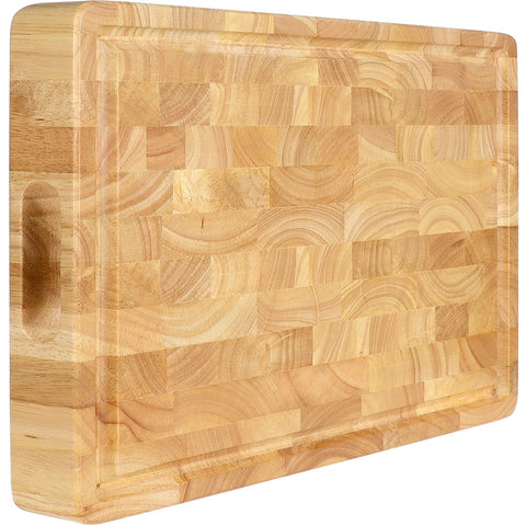 FANICHI end grain cutting board with juice groove catching liquids during prep.