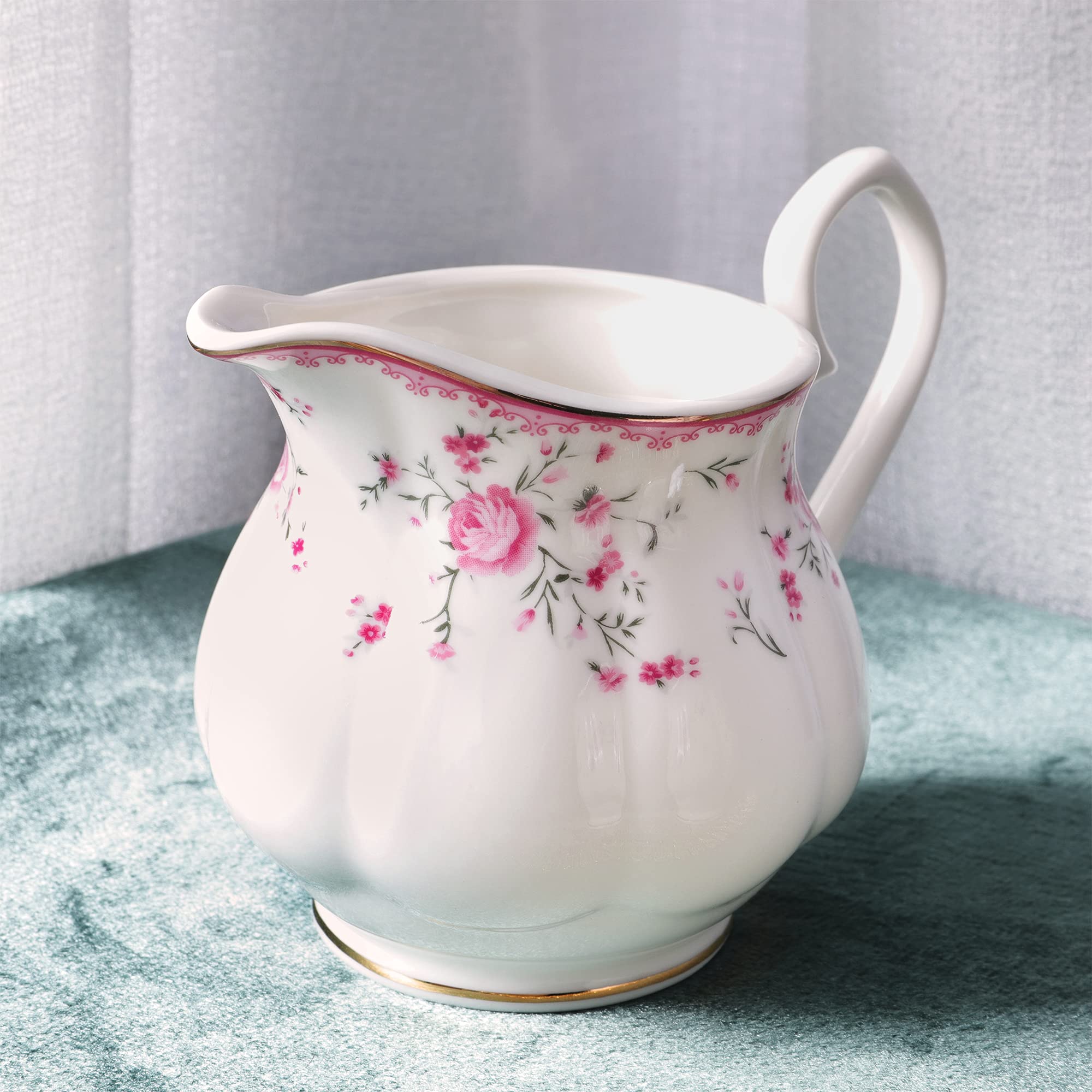 Fanquare pink rose spoons, complete serving accessories for gatherings.