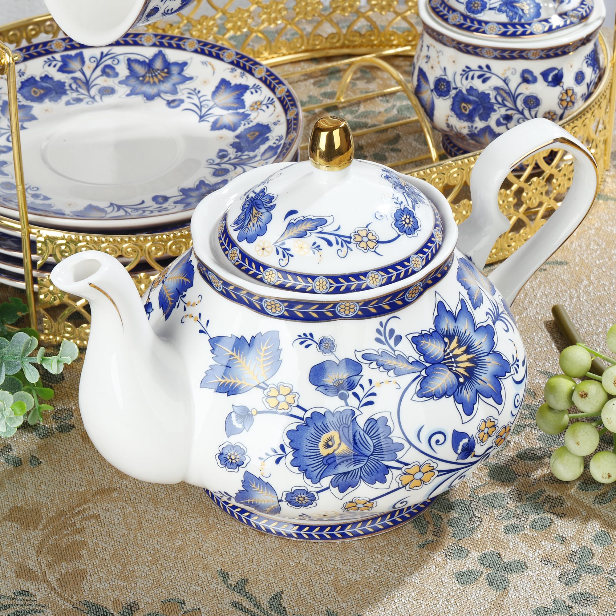 Fanquare blue teapot with porcelain body and gold detail