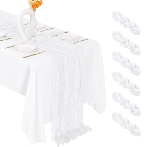 FANTEKE cheesecloth table runner in white drapes gracefully on banquet tables, adding elegant ambience.