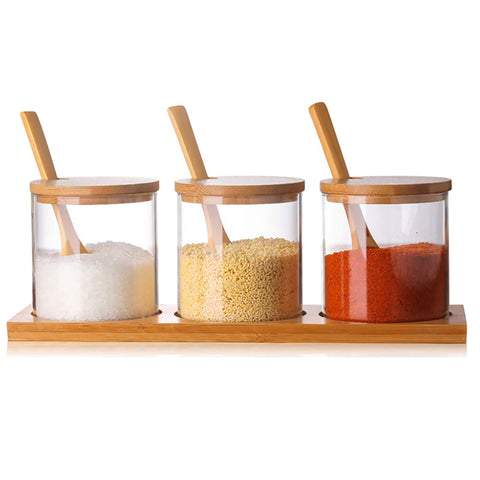 FANTESTICRYAN 3-piece glass condiment canisters with lids for organized kitchen storage.
