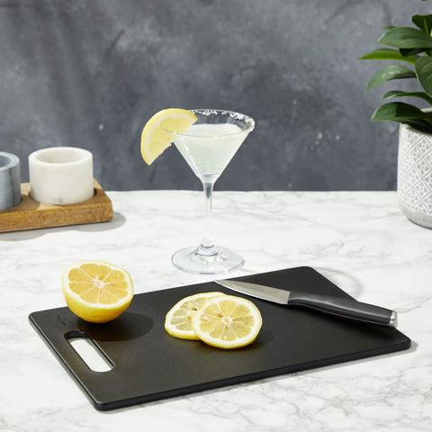 Farmlyn Creek cutting board with easy-grip handle for safe lifting during prep.