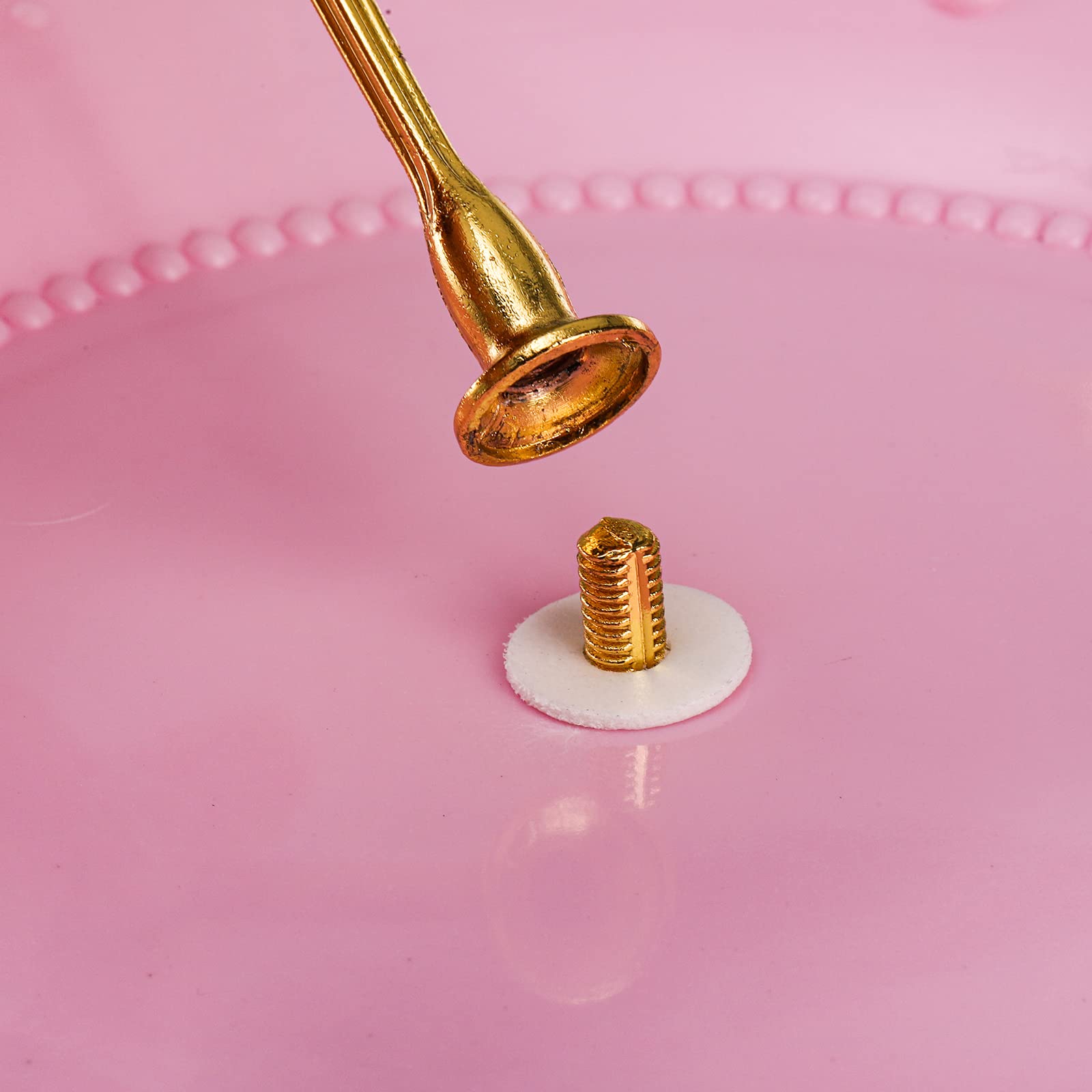 Fasmov display stand shows embossed floral details and a pull-ring design for easy setup