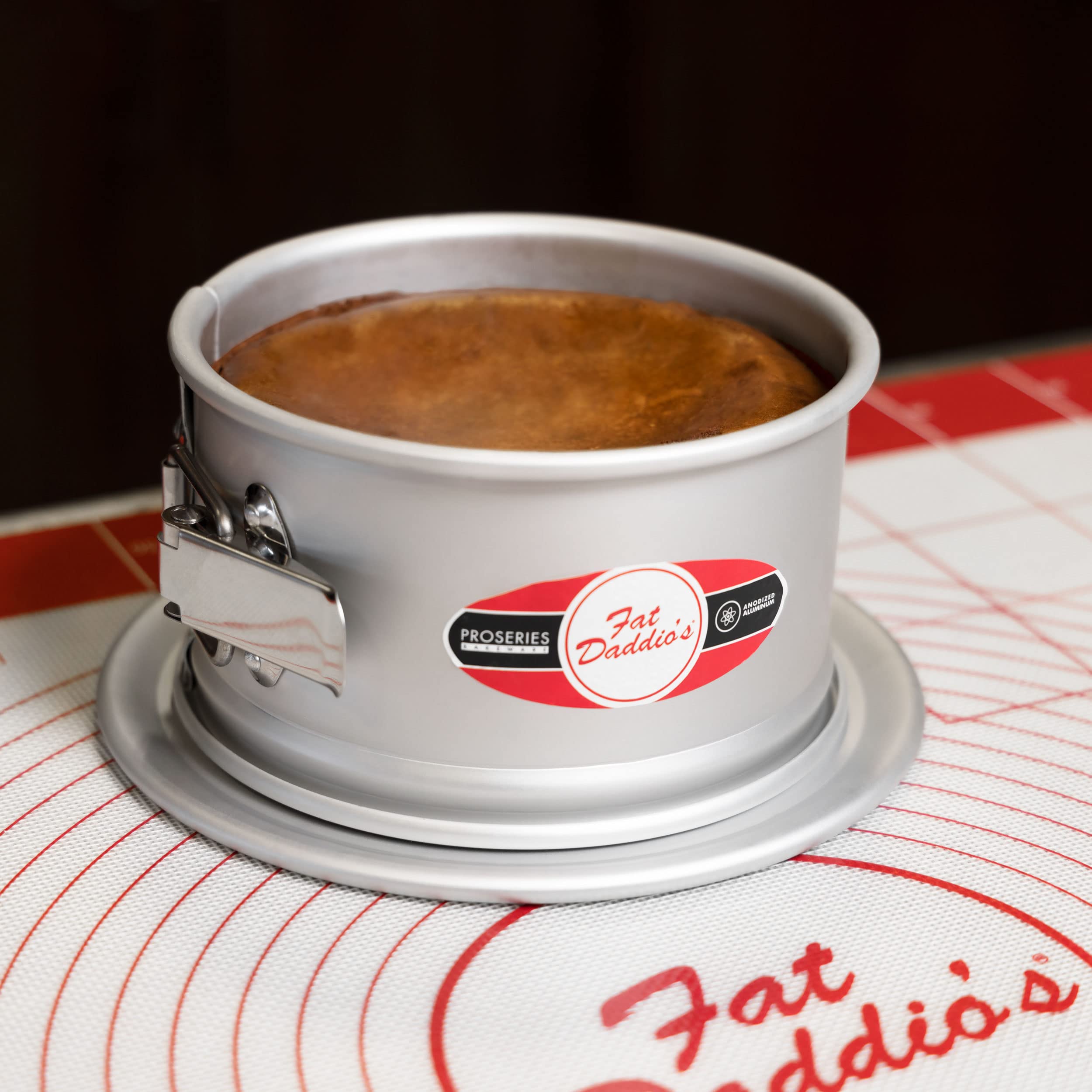 Fat Daddio's round springform pan interior highlighting seamless bake surface for clean cut.