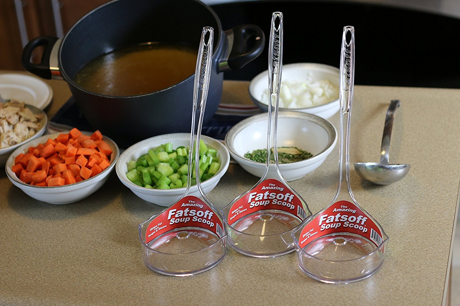 Fatsoff Soup Scoop in a large pot enabling versatile fat removal for any pot.