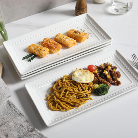 Feenmai white porcelain platters display appetizers and desserts at gatherings.