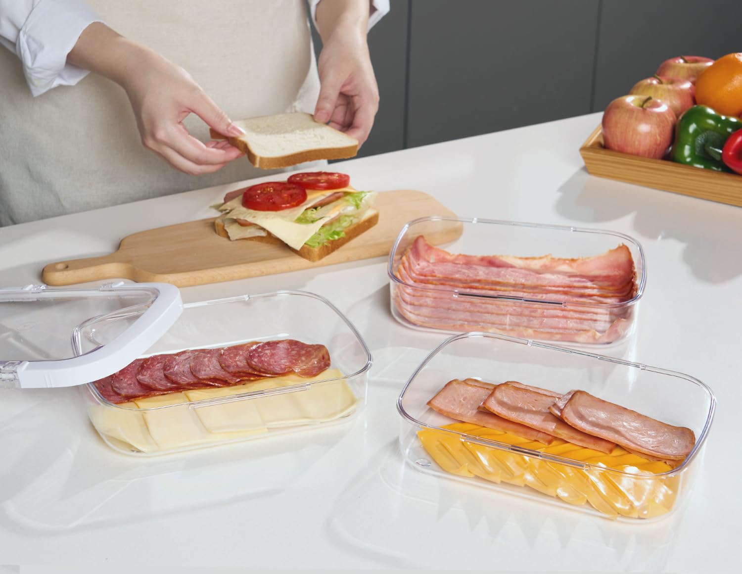 Three-pack of Felli Duo Loc boxes for organized deli meat storage in fridge.