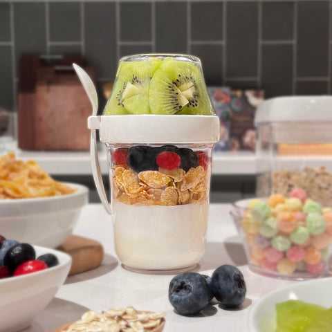 Felli snack cup with spoon and lid demonstrates convenient spill-free travel.