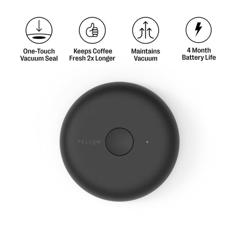 Fellow Atmos lid twist action close up illustrating air removal feature