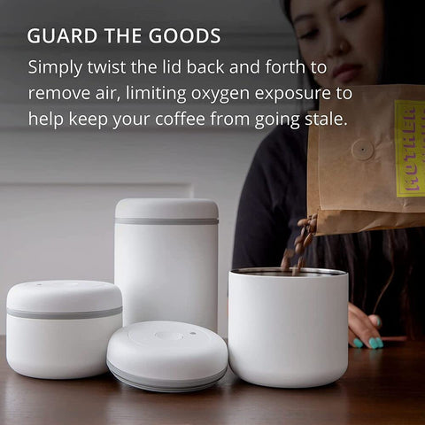 Fellow Atmos matte white canister adds modern style to your kitchen storage.