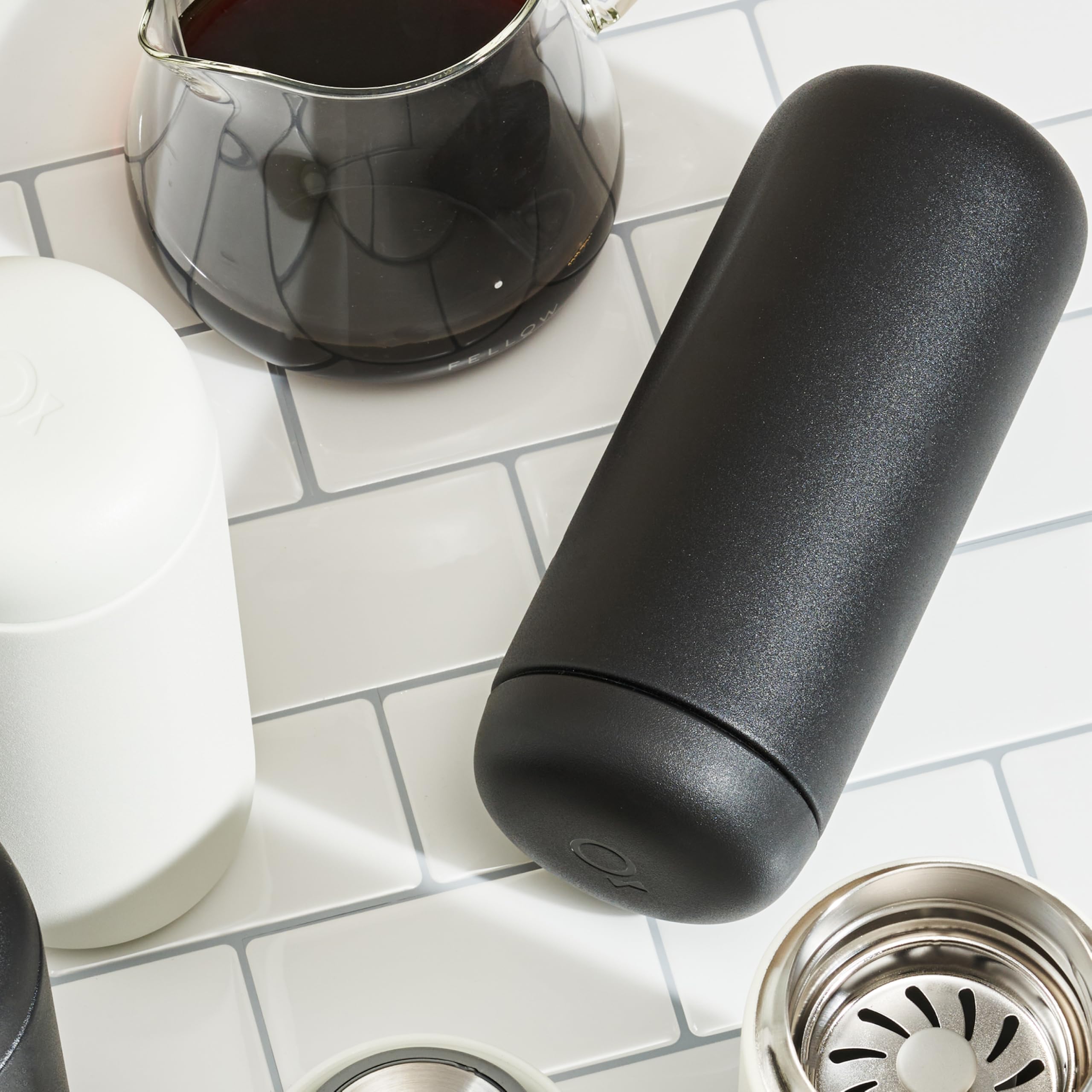 Fellow Carter Move mug ceramic interior preserves pure flavor during commutes.
