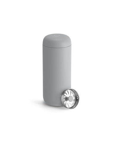 Fellow Carter Move mug with splash guard for on-the-go coffee without spills.