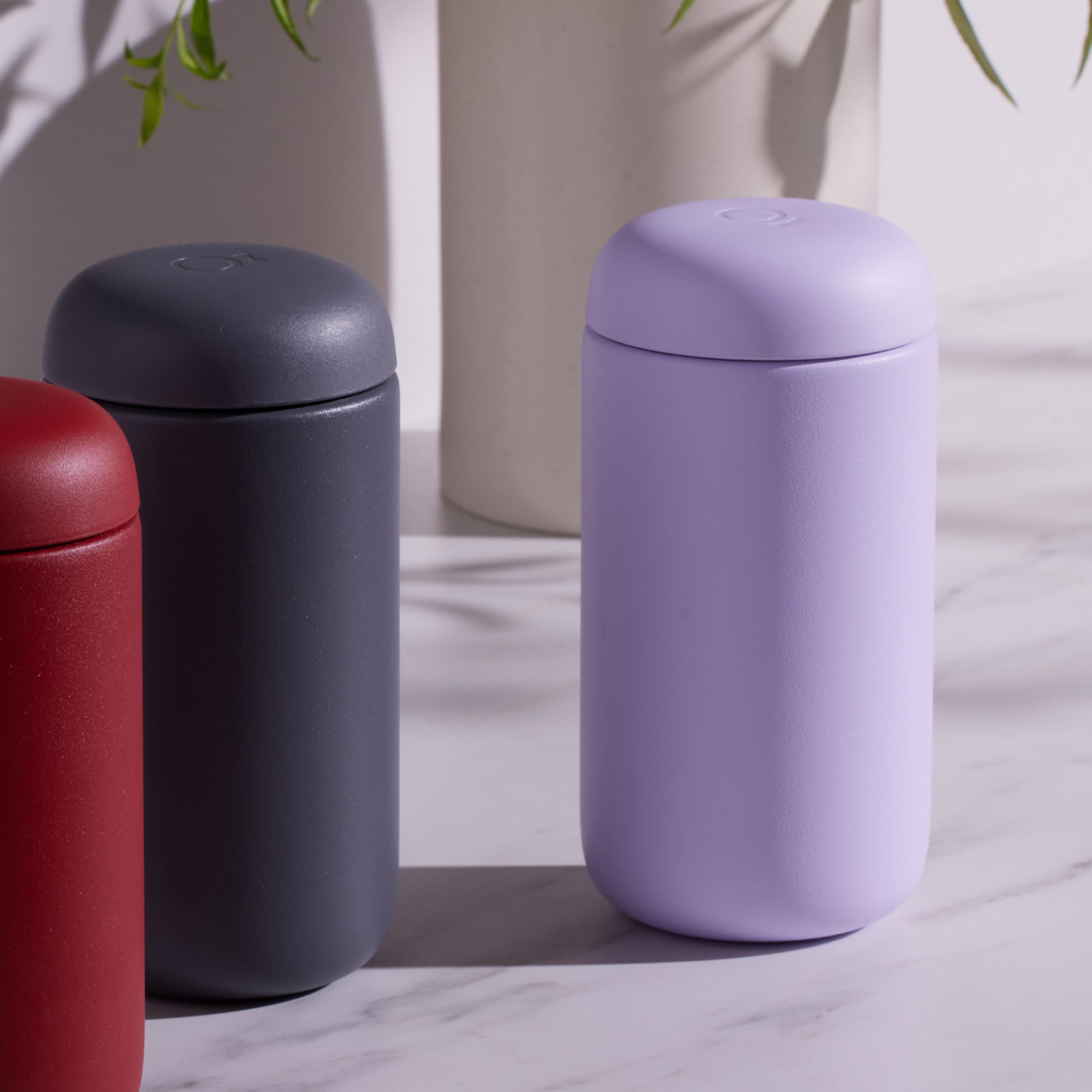 Slim 12 oz mug slides into most cup holders without compromising brew flavor.