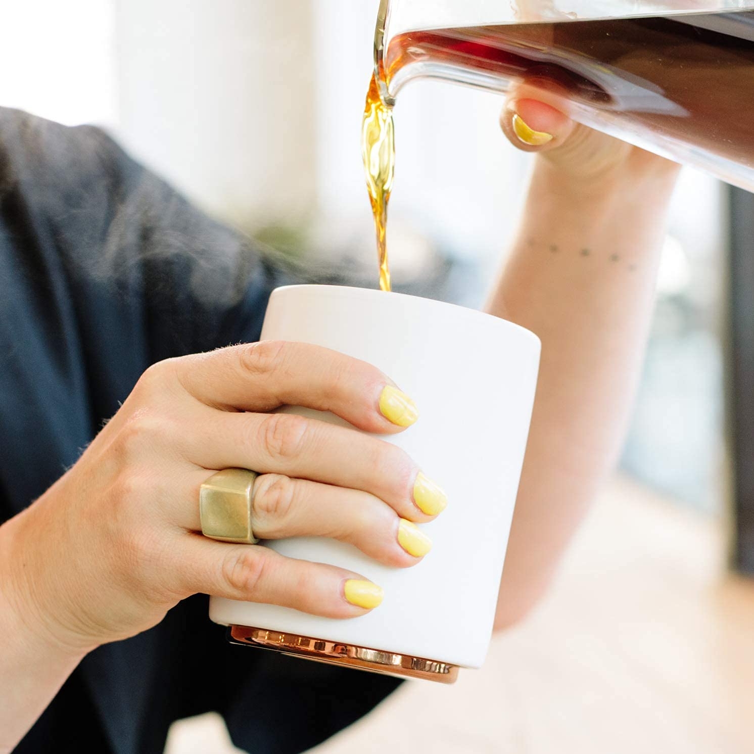 Monty cup stackable design demonstrated for organized storage.