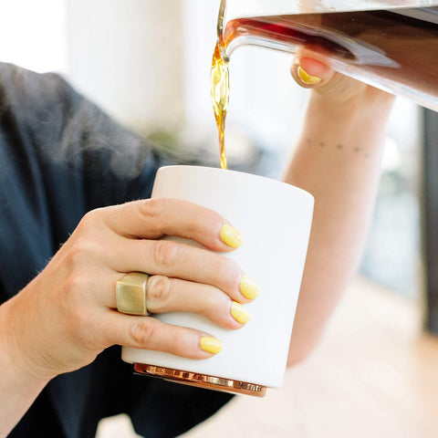 Monty cup stackable design demonstrated for organized storage.