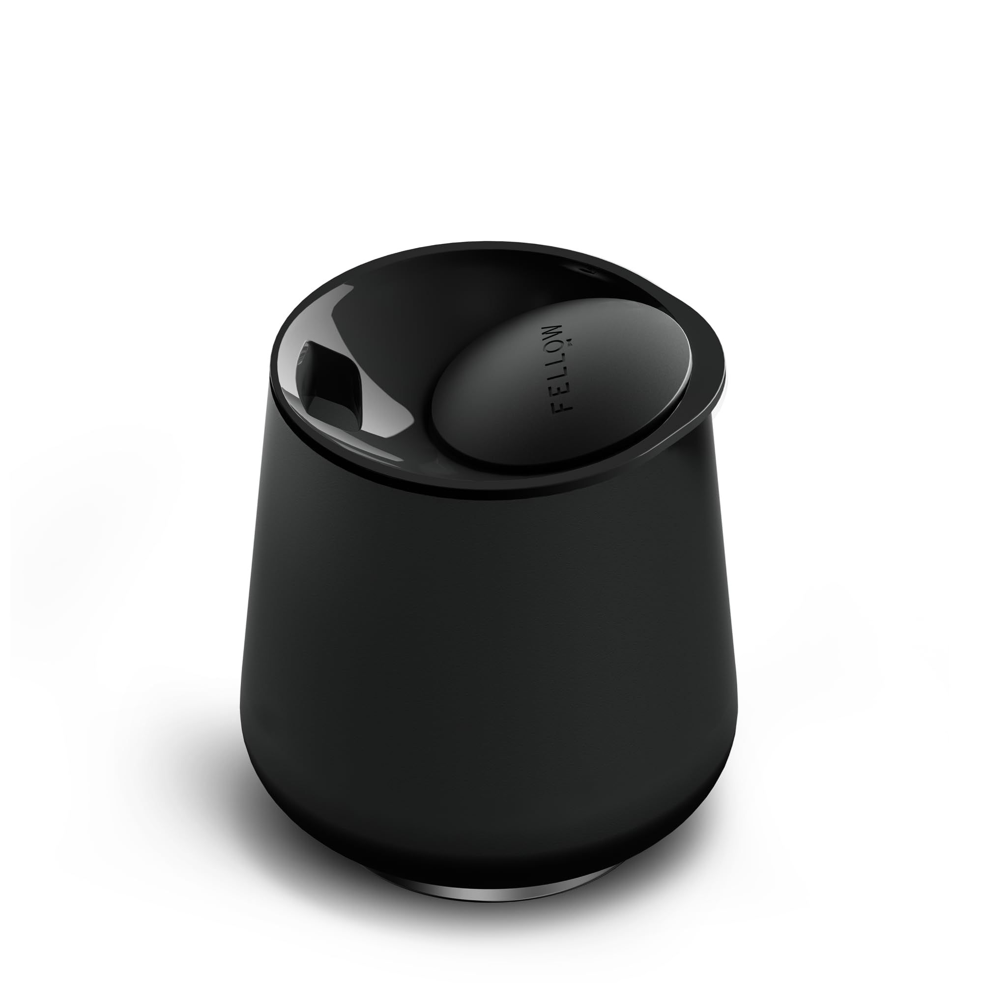 Fellow Ruby wine tumbler with ceramic interior preserves flavor and aroma outdoors.