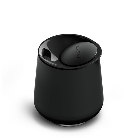 Fellow Ruby wine tumbler with ceramic interior preserves flavor and aroma outdoors.