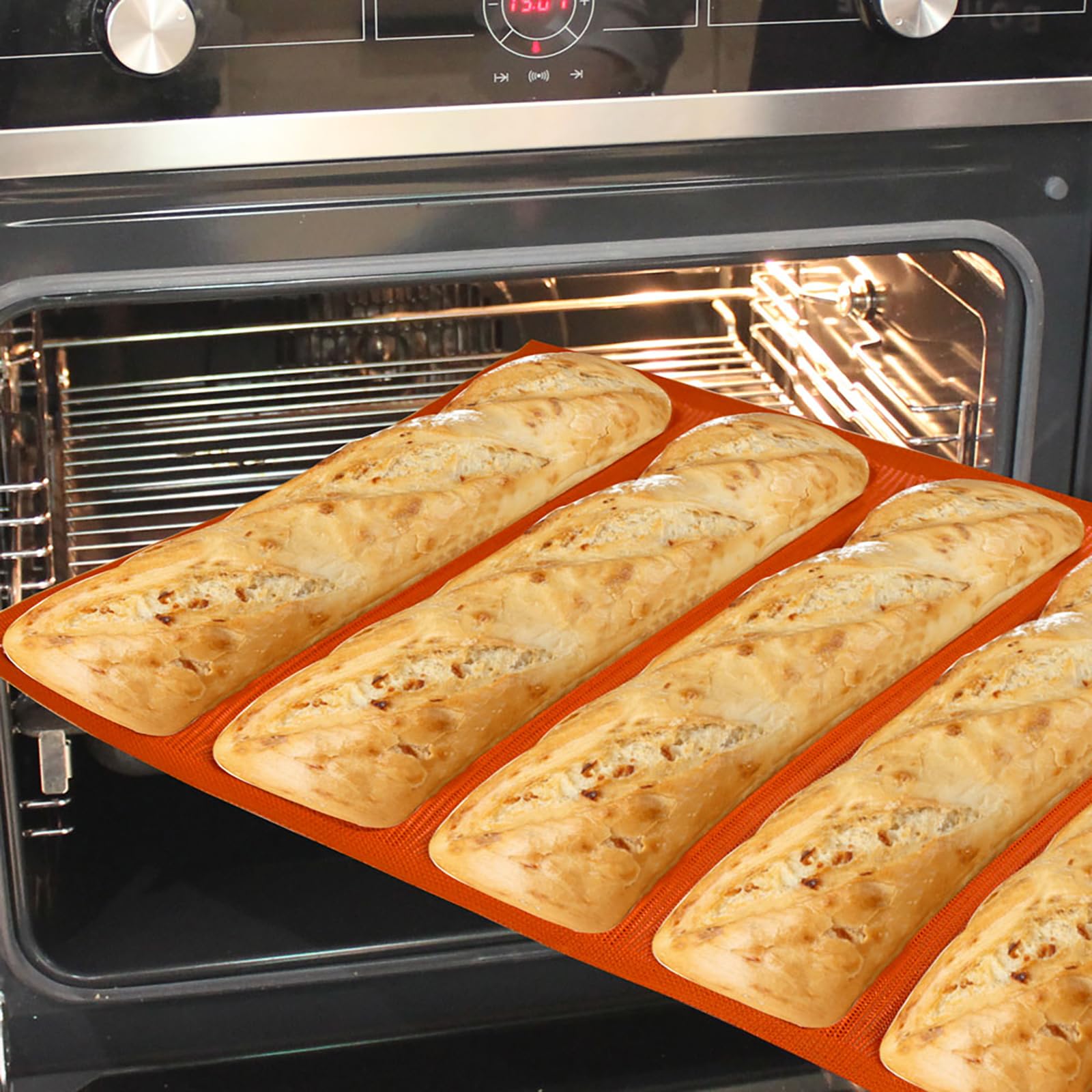 FETESUR silicone perforated baking forms close-up orange shows five-loaf capacity.