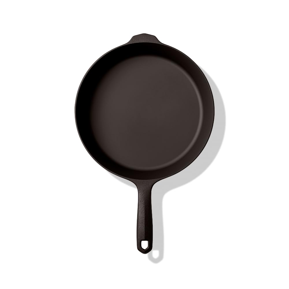 Field Company skillet handle shown for easy lifting from stove to table