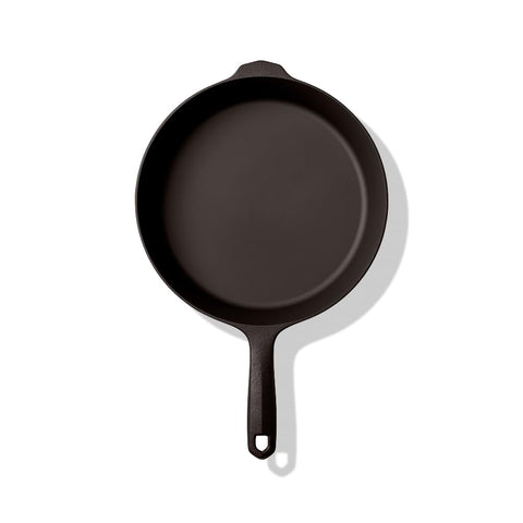 Field Company skillet handle shown for easy lifting from stove to table