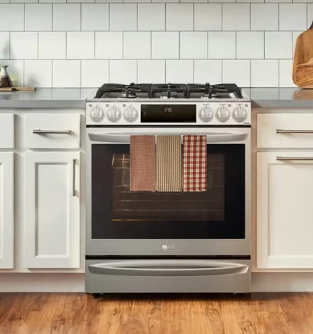fillURbasket plaid towel complements burgundy and tan kitchen decor.