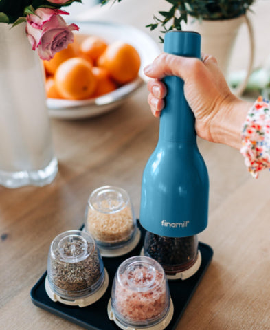 FinaMill Classic battery compartment open for easy battery replacement.