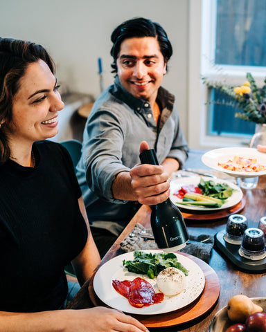 FinaMill in use at table with LED for precise seasoning