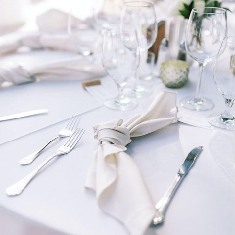 FindYou party buffet setup with bright white finish on tables